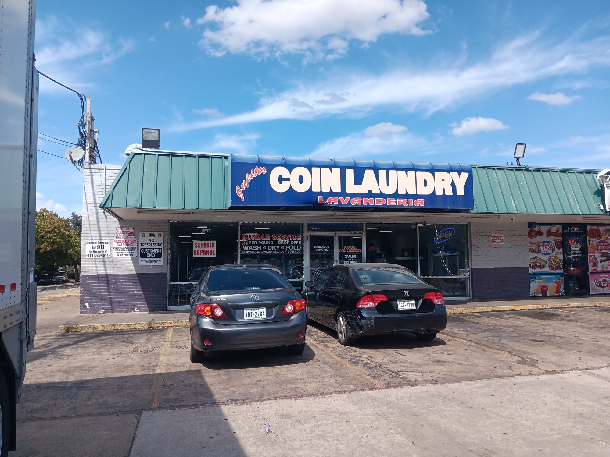 Jupiter Coin Laundry and Lavenderia store entrance, Dallas